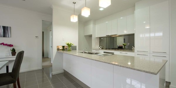 Allenby Villa kitchen feature light white gloss cupboards custom 